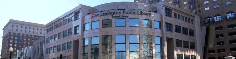 The downtown branch of the Lexington Public Library features a bowed front and large windows.