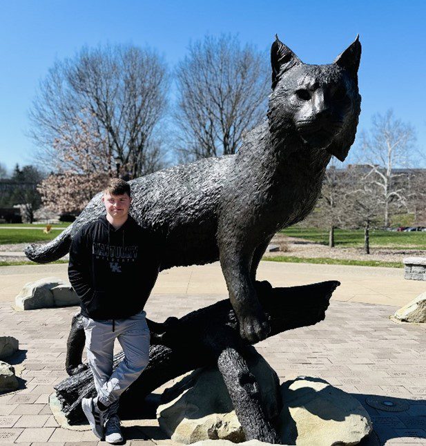Justin in front of UK Wildcat statue
