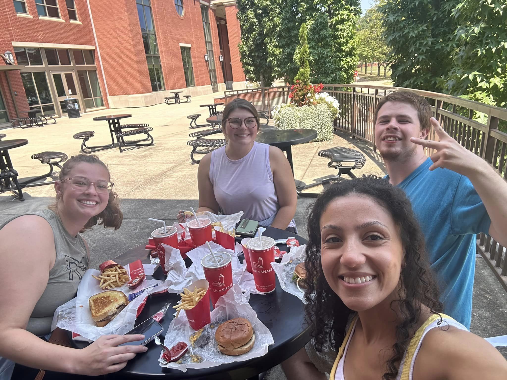 Group of people eating at an outdoor cafe